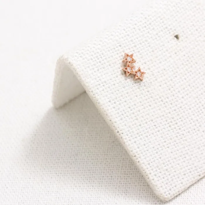 from J Shop CZ Triple Star Ear Piercing Earrings